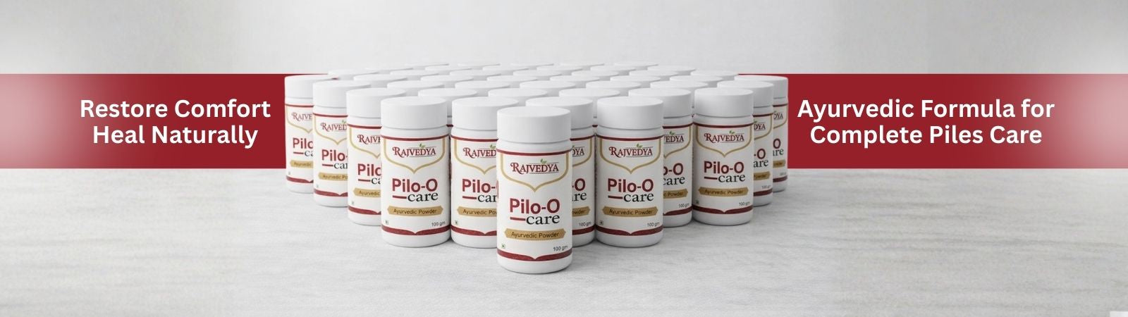 Row of Pilo-O Care bottles on a white background with promotional text about an Ayurvedic formula for piles care.